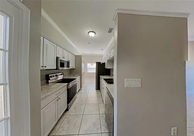 Photo 4 of Single family home for sale at 11706 Broad Oak Ct, Orlando, FL 32837 | MLS# C7531754 | Listing updated on 2026-10-29
