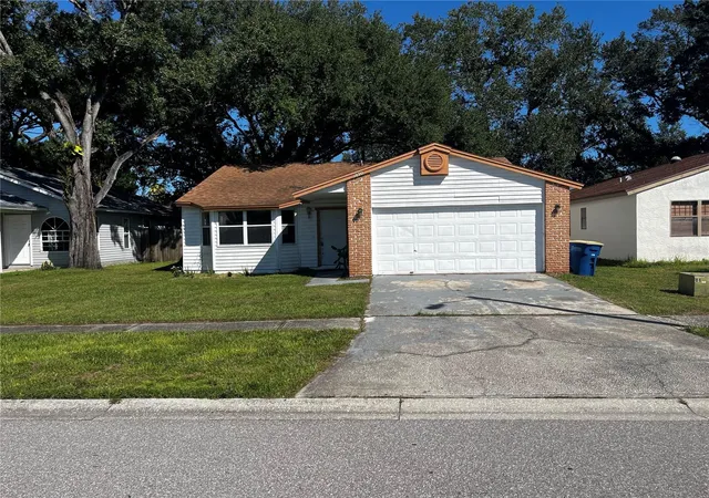 Photo 1 of Single family home for sale at 1890 Feather Tree Cir, Clearwater, FL 33765 | MLS# TB8556280 | Listing updated on 2026-10-13