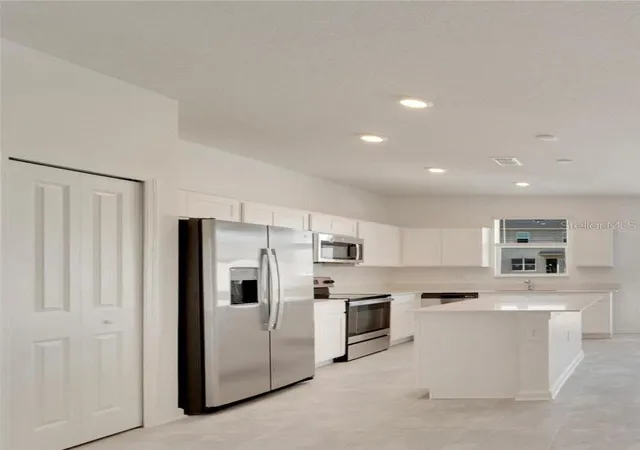 Photo 2 of Townhouse for sale at 138 Nine Iron Dr, Davenport, FL 33896 | MLS# S5159156 | Listing updated on 2026-10-08