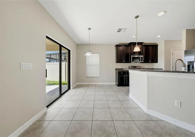 Photo 3 of Single family home for sale at 10147 Newminster Loop, Ruskin, FL 33573 | MLS# TB8556310 | Listing updated on 2026-10-12