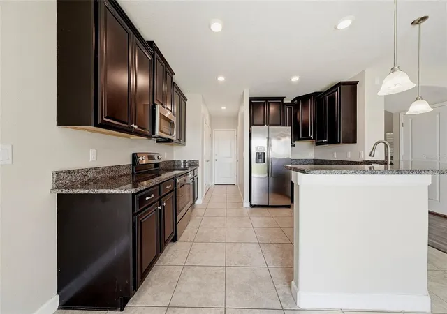 Photo 4 of Single family home for sale at 10147 Newminster Loop, Ruskin, FL 33573 | MLS# TB8556310 | Listing updated on 2026-10-12