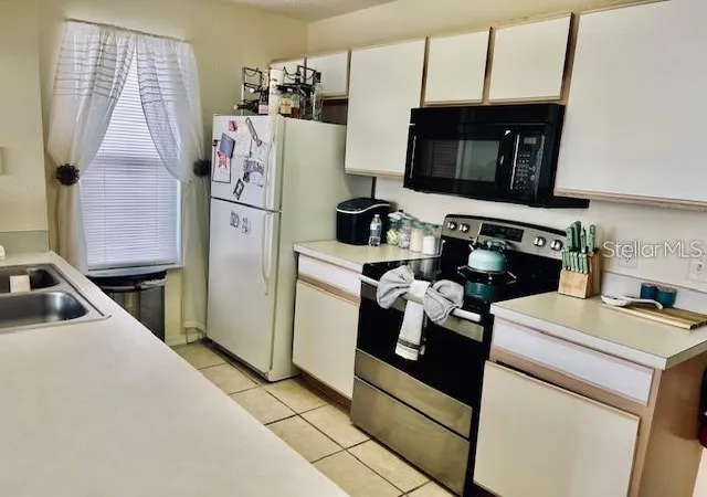 Photo 4 of Condo for sale at 8705 Knightsbridge Ct #C, Kissimmee, FL 34747 | MLS# O6448454 | Listing updated on 2026-10-09