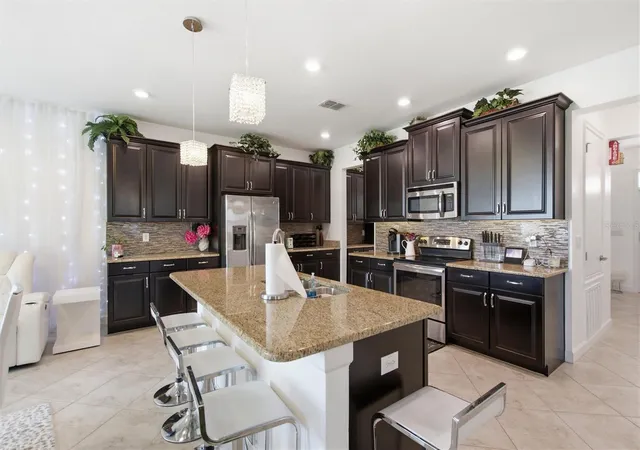 Photo 3 of Single family home for sale at 1407 Pro Shop Ct, Davenport, FL 33896 | MLS# S5159164 | Listing updated on 2026-10-10