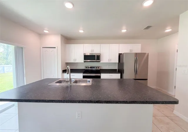 Photo 1 of Single family home for sale at 370 Hyacinth St, Port Charlotte, FL 33954 | MLS# O6448471 | Listing updated on 2026-10-09