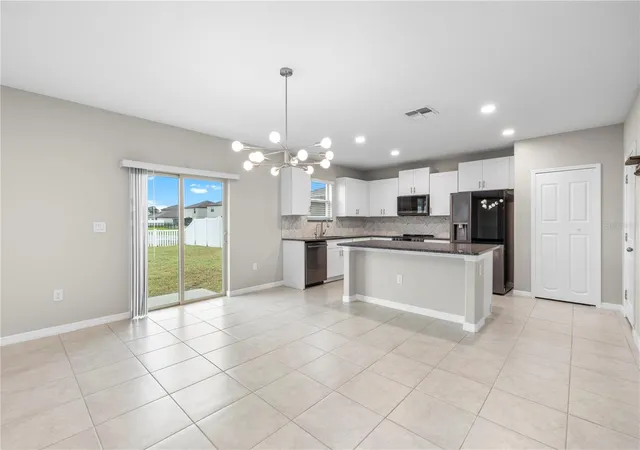 Photo 4 of Single family home for sale at 12952 Wildflower Meadow Dr, Riverview, FL 33579 | MLS# TB8556358 | Listing updated on 2026-10-09