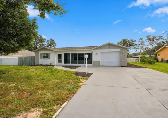 Photo 1 of Single family home for sale at 2048 Waterfall Dr, Spring Hill, FL 34608 | MLS# W7890206 | Listing updated on 2026-10-09