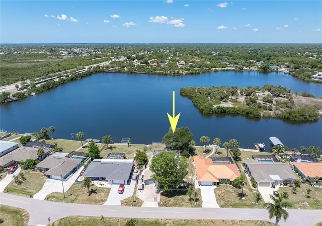 Photo 2 of Single family home for sale at 174 Spring Lake Blvd Nw, Port Charlotte, FL 33952 | MLS# C7531771 | Listing updated on 2026-10-09