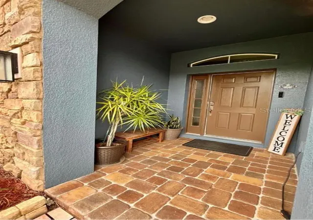 Photo 3 of Single family home for sale at 1033 Fountain Coin Loop, Orlando, FL 32828 | MLS# O6448513 | Listing updated on 2026-10-10