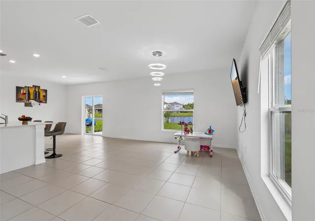 Photo 3 of Single family home for sale at 5605 Gingham Dr, Kissimmee, FL 34758 | MLS# TB8556381 | Listing updated on 2026-10-09