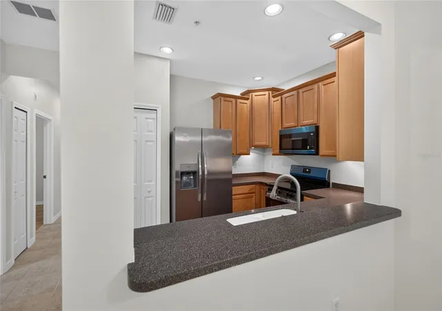 Photo 3 of Condo for sale at 3707 Parkridge Cir #7-106, Sarasota, FL 34243 | MLS# A4708979 | Listing updated on 2026-10-10