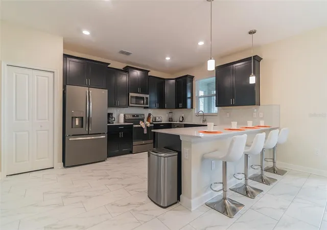 Photo 4 of Single family home for sale at 8844 Cabot Cliffs Dr, Davenport, FL 33896 | MLS# O6448535 | Listing updated on 2026-10-08