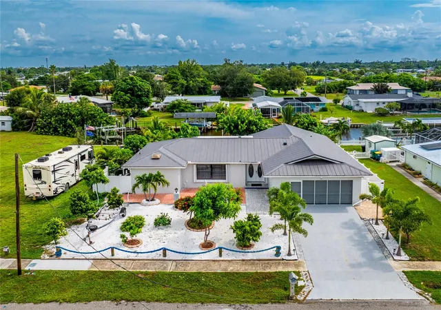 Single family home for sale at 137 Dowling Ave NE, PORT CHARLOTTE, FL 33952 | MLS# C7531778