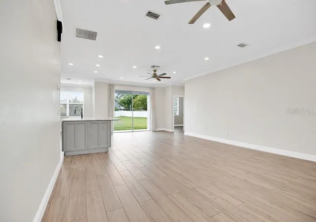 Photo 4 of Single family home for sale at 5100 Tallow Wood Ct, Orlando, FL 32808 | MLS# O6448547 | Listing updated on 2026-10-09