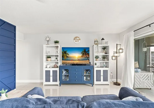 Listing Photo 1 - Condo for sale in building located at 1000 Lake Of The Woods Blvd, Casselberry, FL 32730 - Unit #202B