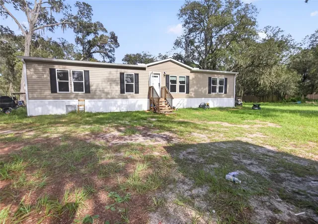 Photo 3 of Manufactured home for sale at 17538 Evelyn Ct, Spring Hill, FL 34610 | MLS# TB8556429 | Listing updated on 2026-10-09