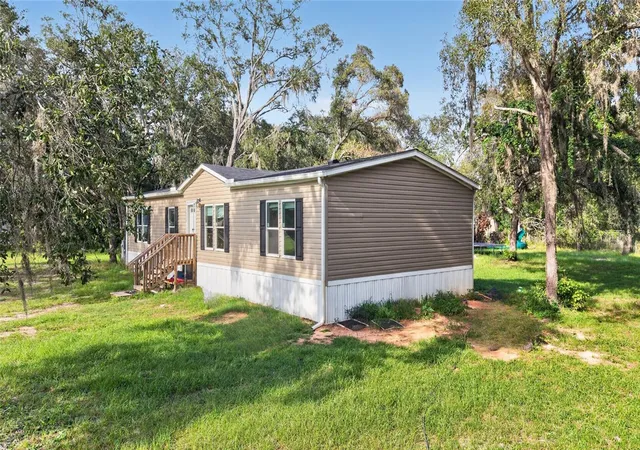 Photo 3 of Manufactured home for sale at 17538 Evelyn Ct, Spring Hill, FL 34610 | MLS# TB8556429 | Listing updated on 2026-10-09
