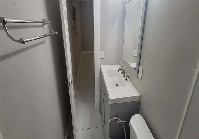 Photo 4 of Single family home for sale at 1716 Watrous Dr, Titusville, FL 32780 | MLS# O6448567 | Listing updated on 2026-10-09