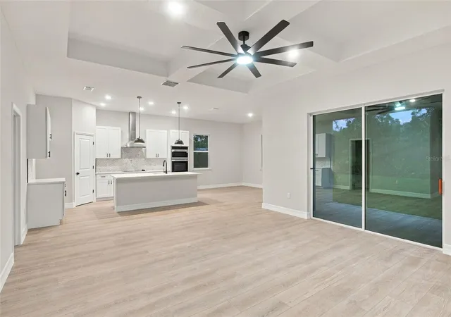 Photo 2 of Single family home for sale at 42435 Royal Trails Rd, Eustis, FL 32736 | MLS# O6448568 | Listing updated on 2026-10-09