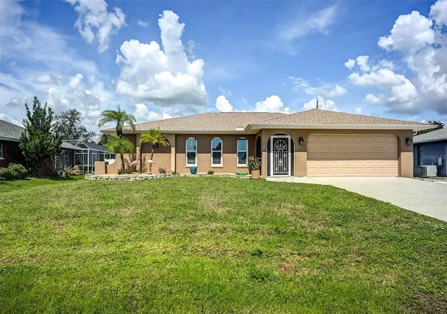 Single family home for sale at 726 Calvert Ave, PORT CHARLOTTE, FL 33948 | MLS# TB8556436