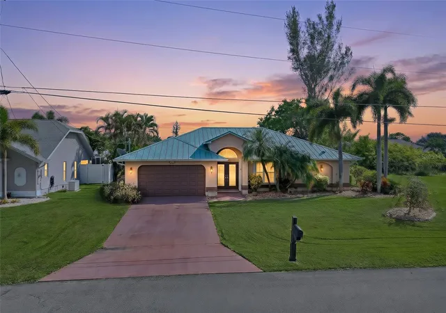 Single family home for sale at 310 SE 23rd Street, CAPE CORAL, FL 33990 | MLS# A4709000