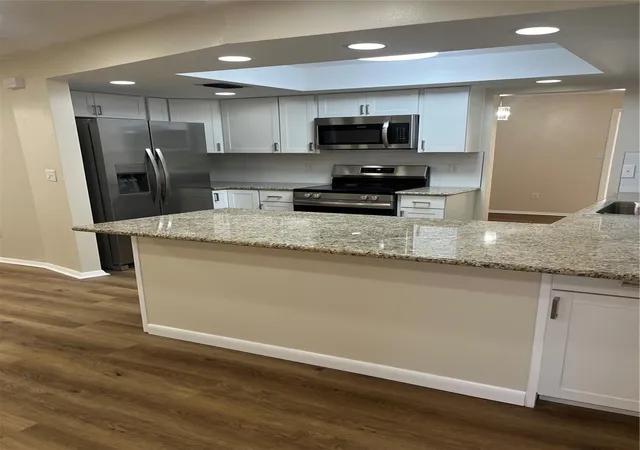 Photo 1 of Single family home for sale at 2080 Sun Tree Cir N, Clearwater, FL 33763 | MLS# TB8556452 | Listing updated on 2026-10-13