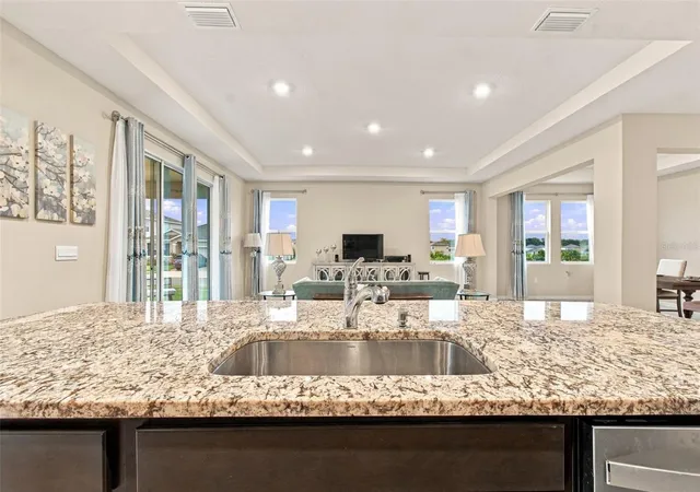 Photo 3 of Single family home for sale at 32337 Conchshell Sail St, Wesley Chapel, FL 33545 | MLS# TB8556458 | Listing updated on 2026-10-09