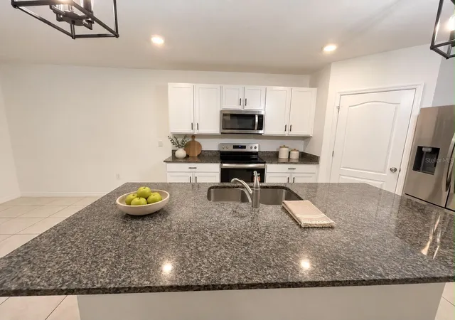 Photo 3 of Single family home for sale at 1144 August Sky Dr, Deltona, FL 32738 | MLS# S5159183 | Listing updated on 2026-10-14