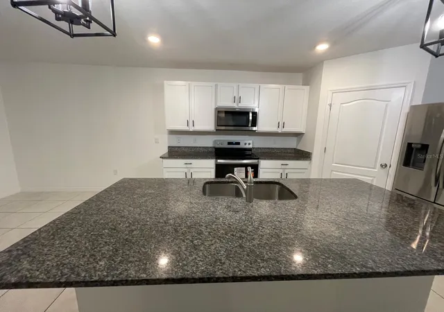 Photo 4 of Single family home for sale at 1144 August Sky Dr, Deltona, FL 32738 | MLS# S5159183 | Listing updated on 2026-10-14