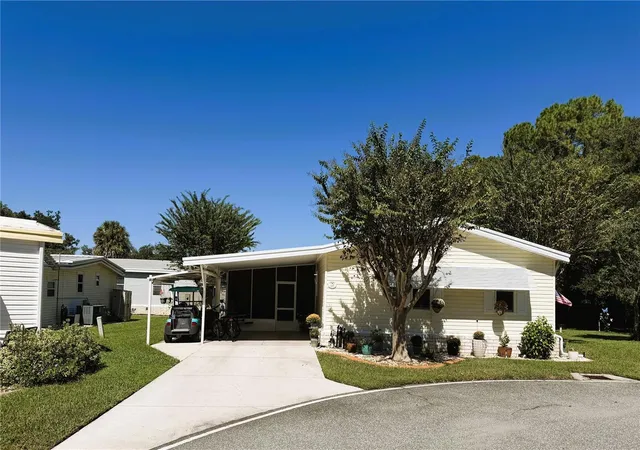 Photo 2 of Manufactured home for sale at 122 Tamarisk Way, Leesburg, FL 34748 | MLS# G5118859 | Listing updated on 2026-10-22