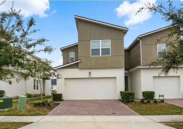 Photo 1 of Townhouse for sale at 1123 Boardwalk Pl, Kissimmee, FL 34747 | MLS# O6448594 | Listing updated on 2026-10-20