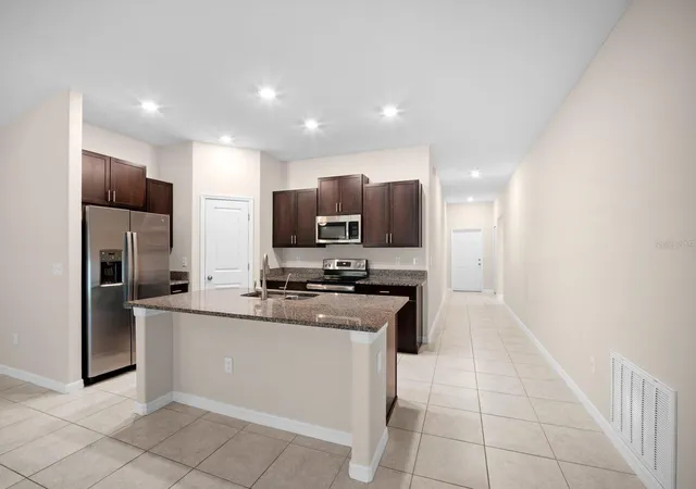 Photo 4 of Single family home for sale at 1983 Fan Aloe Way, Ruskin, FL 33570 | MLS# TB8556494 | Listing updated on 2026-10-09