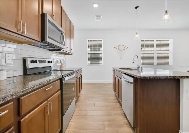 Photo 4 of Townhouse for sale at 3280 Canna Lily Pl, Clermont, FL 34711 | MLS# O6448602 | Listing updated on 2026-10-10
