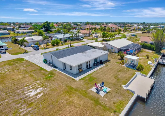 Photo 1 of Single family home for sale at 106 Leland St SE, Port Charlotte, FL 33952 | MLS# O6448609 | Listing updated on 2026-10-08