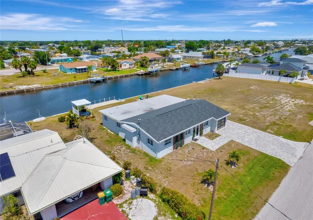Photo 2 of Single family home for sale at 106 Leland St SE, Port Charlotte, FL 33952 | MLS# O6448609 | Listing updated on 2026-10-08