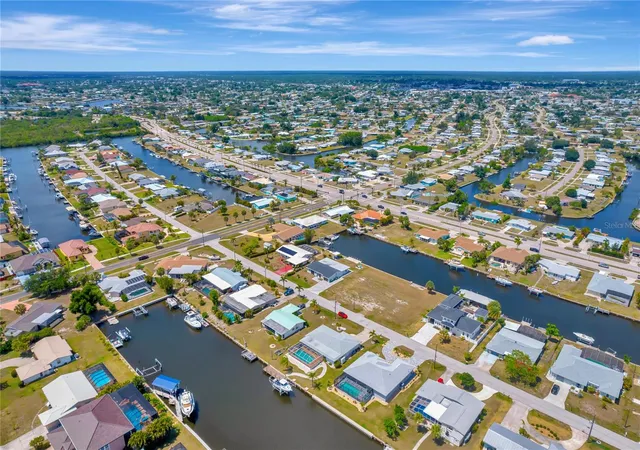 Photo 3 of Single family home for sale at 106 Leland St SE, Port Charlotte, FL 33952 | MLS# O6448609 | Listing updated on 2026-10-08