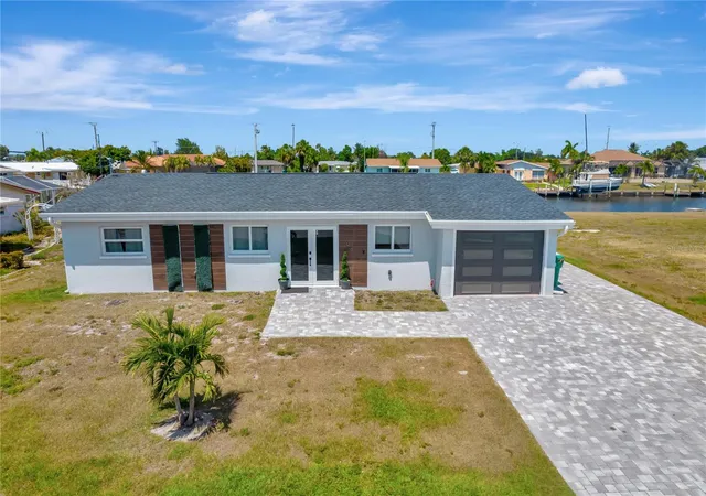 Photo 4 of Single family home for sale at 106 Leland St SE, Port Charlotte, FL 33952 | MLS# O6448609 | Listing updated on 2026-10-08