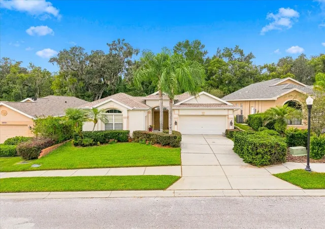 Single family home for sale at 12220 Woodlands Cir, DADE CITY, FL 33525 | MLS# TB8556509