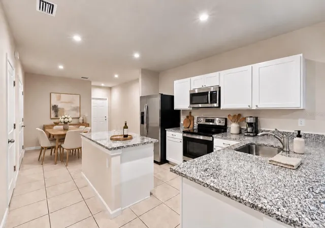 Photo 2 of Townhouse for sale at 12309 Grizzly Ln, New Port Richey, FL 34654 | MLS# TB8556518 | Listing updated on 2026-10-09