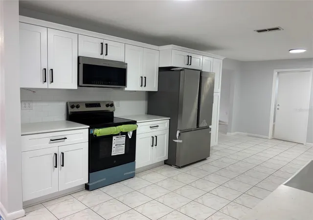 Photo 3 of Single family home for sale at 235 S Lee St, Beverly Hills, FL 34465 | MLS# OM733745 | Listing updated on 2026-10-09