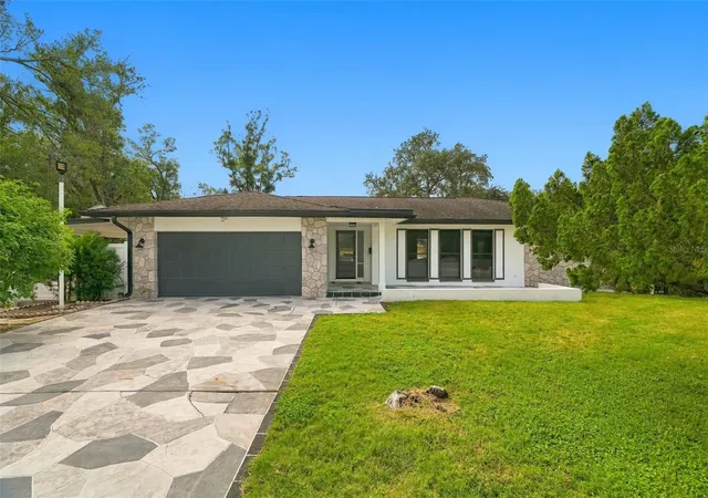 Photo 3 of Single family home for sale at 330 Patica Rd NE, Saint Petersburg, FL 33702 | MLS# TB8556567 | Listing updated on 2026-10-09