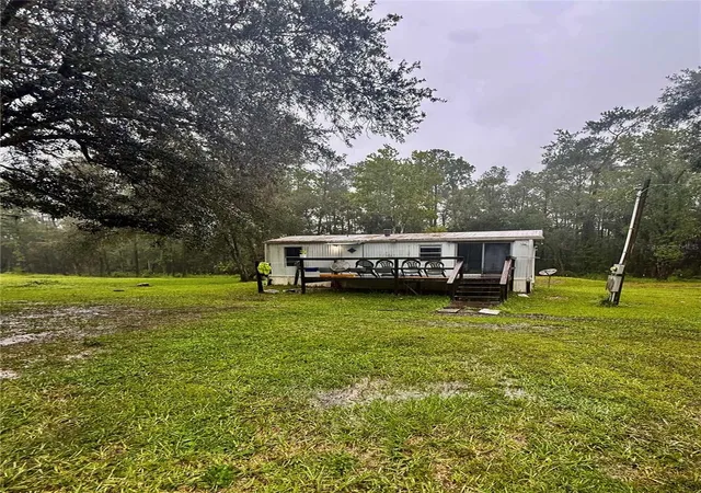 Photo 1 of Manufactured home for sale at 10379 Ne Highway 314, Silver Springs, FL 34488 | MLS# OM733754 | Listing updated on 2026-10-10