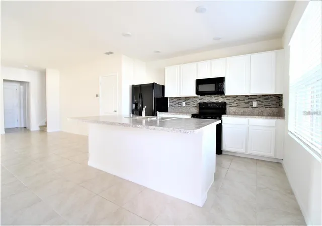 Photo 4 of Townhouse for sale at 1842 Katz Xing Dr, Kindred, FL 34744 | MLS# O6448689 | Listing updated on 2026-10-10