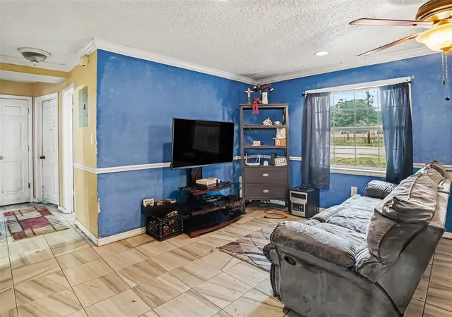 Photo 3 of Single family home for sale at 2205 N Hiawasee Rd, Orlando, FL 32818 | MLS# O6448691 | Listing updated on 2026-10-22