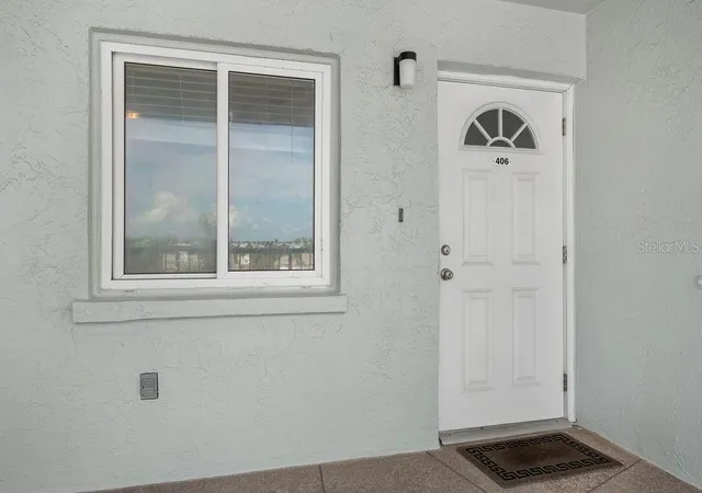 Photo 1 of Condo for sale at 5200 Gulf Dr #406, Holmes Beach, FL 34217 | MLS# A4709054 | Listing updated on 2026-10-27