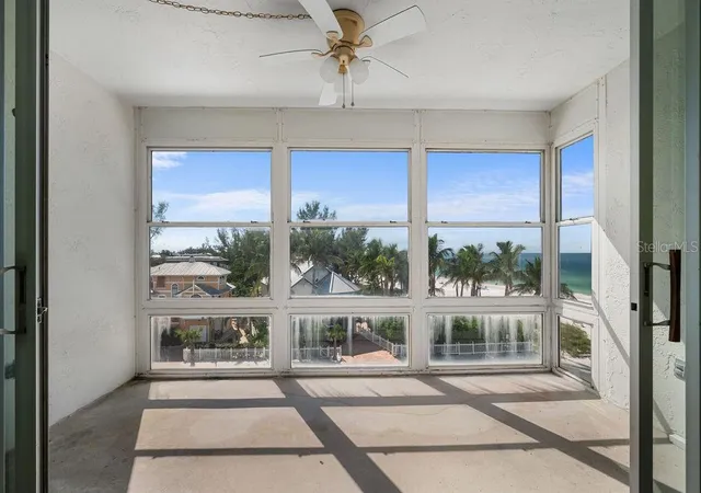 Photo 3 of Condo for sale at 5200 Gulf Dr #406, Holmes Beach, FL 34217 | MLS# A4709054 | Listing updated on 2026-10-27