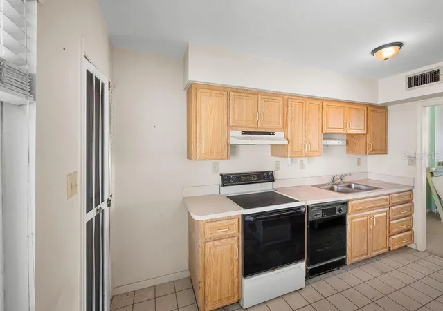 Photo 4 of Condo for sale at 5200 Gulf Dr #406, Holmes Beach, FL 34217 | MLS# A4709054 | Listing updated on 2026-10-27