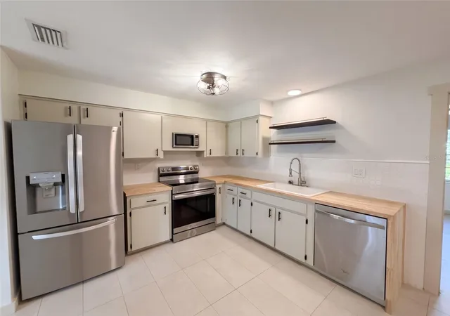 Photo 2 of Single family home for sale at 34390 Orchid Pkwy, Dade City, FL 33523 | MLS# O6448707 | Listing updated on 2026-10-10