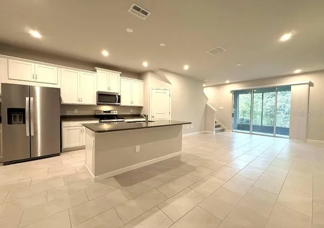Photo 3 of Townhouse for sale at 4166 Cloud Hopper Way, Lutz, FL 33559 | MLS# TB8556620 | Listing updated on 2026-10-10