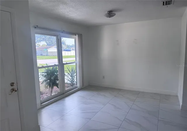Photo 4 of Single family home for sale at 5208 Carrollwood Meadows Dr, Tampa, FL 33625 | MLS# TB8556623 | Listing updated on 2026-10-10