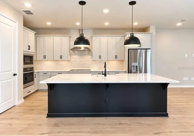 Photo 4 of Single family home for sale at 15053 Sirleaf Dr, Orlando, FL 32827 | MLS# TB8556630 | Listing updated on 2026-10-10